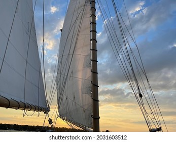 Setting Sail On The Bay As The Sun Sets