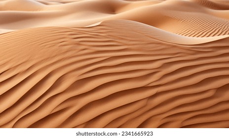 夕陽は広がる波打つサウジアラビアの砂漠に鮮やかな光を投げかけ、砂丘の頂を照らします。の写真素材