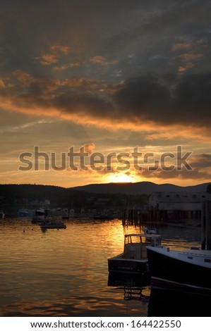 Setting sun on a harbor on Mount Desert Island Maine
