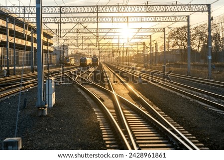 Setting sun over multiple railway tracks