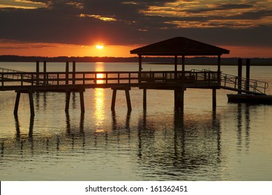 "Setting Sun" Sunset on the Colleton River tidal estuary in Beaufort County SC.