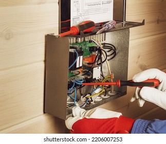 setting the voltage block for the Finnish sauna - Shutterstock ID 2206007253