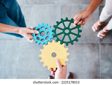 Settings, gear icon and teamwork with business people or team together for collaboration and synergy with cog wheel strategy. Office group hands for problem solving, innovation and development
