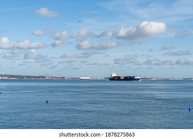 Setubal, Portugal - 17 December, 2020: Large Freight Ship Leaving The Industrial Port At Setubal For A Transatlantic Crossing