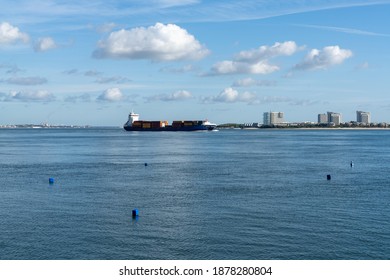 Setubal, Portugal - 17 December, 2020: Large Freight Ship Leaving The Industrial Port At Setubal For A Transatlantic Crossing