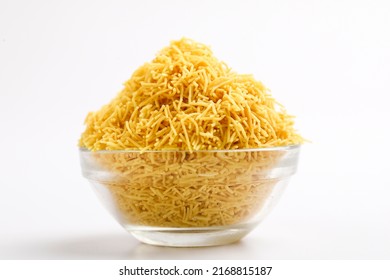 Sev. Besan Sev Indian Namkeen Noodles of chickpea flour. Besan Sev Popular Teatime Snack.