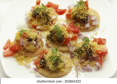 Sev Puri Fried Flour (puri) Topped With Sev, Onion,potato And Other Masala