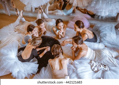 The seven ballerinas against ballet bar - Powered by Shutterstock