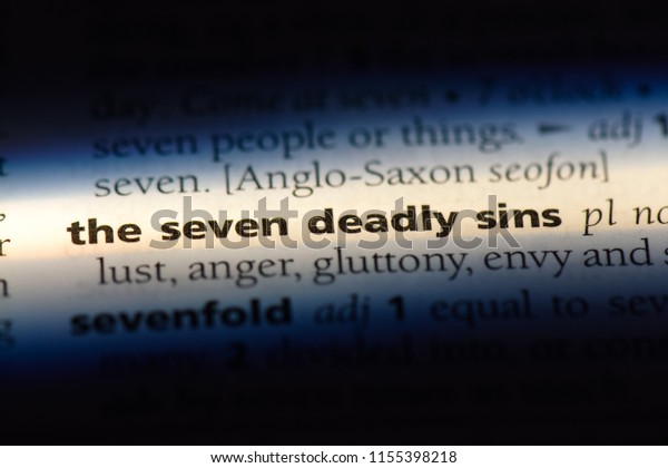 the seven deadly sins word in a dictionary. the\
seven deadly sins concept.