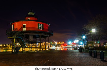 Seven Foot Knoll Lighthouse at night, in the Inner Harbor, Baltimore, Maryland.