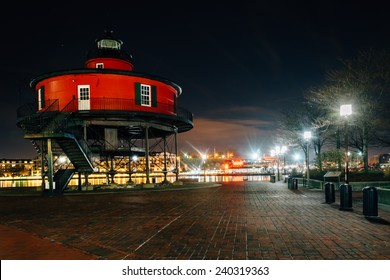 Seven Foot Knoll Lighthouse at night, in the Inner Harbor, Baltimore, Maryland.