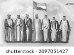 Seven founding fathers standing with flag after signing the union document; commemorative 50 fifty Dirhams with Memorial to the martyrs. Portrait from UAE United Arab Emirates 50 Dirhams 2021 Banknote