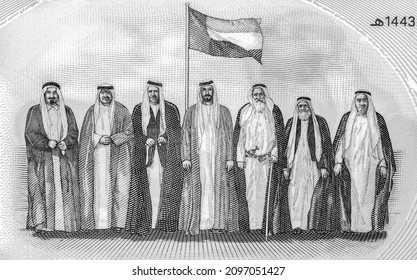 Seven founding fathers standing with flag after signing the union document; commemorative 50 fifty Dirhams with Memorial to the martyrs. Portrait from UAE United Arab Emirates 50 Dirhams 2021 Banknote - Shutterstock ID 2097051427