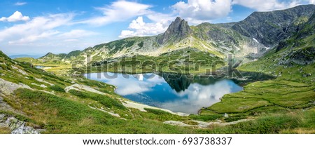 Seven Rila lakes, pictured here is The Twins lake, while The Trefoil is visible to the left, part of the Rila mountain national park in Bulgaria