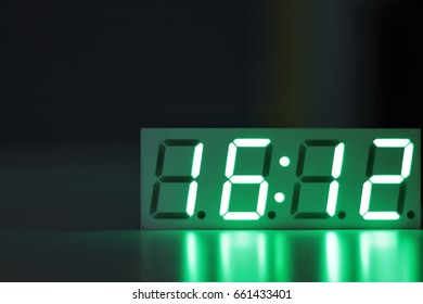  A Seven Segment Clock On A Table