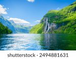 Seven Sisters Waterfall, Geiranger Fjord, Norway. Nature in fjords. Panoramic view. Traveling on a Norwegian fjord. Scandinavia. Vacation and travel in summer Norway.