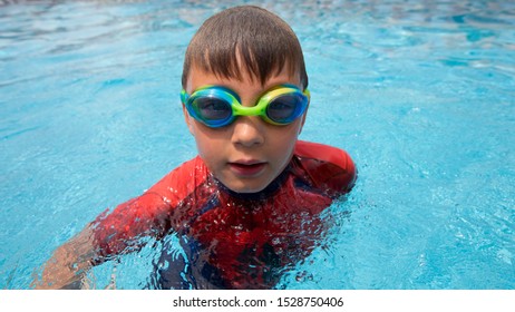 Seven Year Old Boy Playing Swimming Stock Photo 1528750406 | Shutterstock