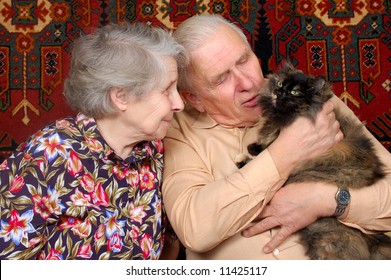 seventy year old couple with cat