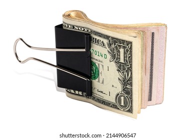 Several American dollar bills rolled and tied up. A bundle of American dollars is pinched by a binder close-up shot. Usd money wad, bundle of usa cash. - Shutterstock ID 2144906547
