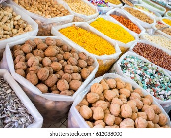 Several Bags With Colorful Food And Spices In A Market Souq At Nizwa, Oman