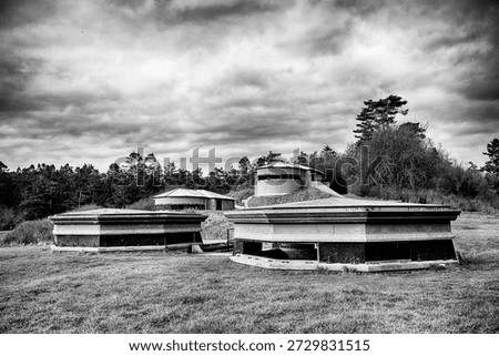 Several of the command bunkers are located at Fort Casey in a field overlooking Puget Sound.