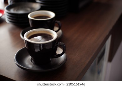 Several Cups Of Long Black Coffee On The Barista Table. Food Background