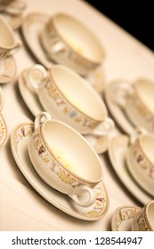 Several cups of tea ready to be served.