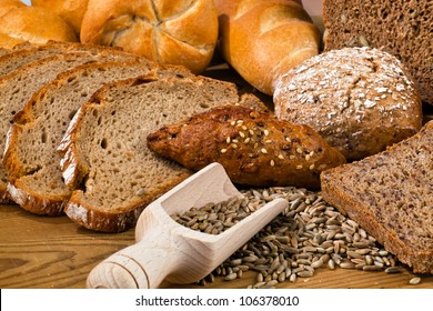 several different types of bread. healthy diet with fresh baked goods.