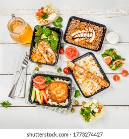 Several Dishes In Plastic Containers Shot From Above