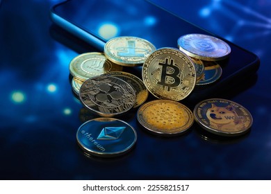 Several golden cryptocurrencies highlighting the Bitcoin coin with graphics in blue color