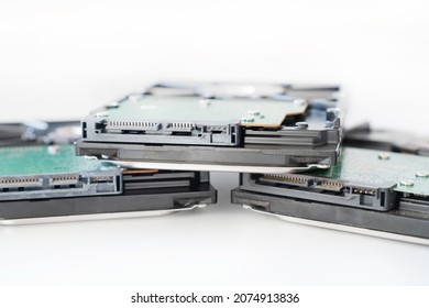 several hard drives for a computer close-up on a light background