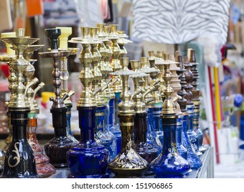 Several hookahs lined up in a shop