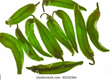 Several Hot Green Hatch Chili Peppers Isolated On White Background