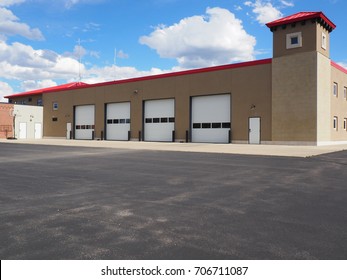 Several Large Closed Garage Doors For A Small Warehouse.