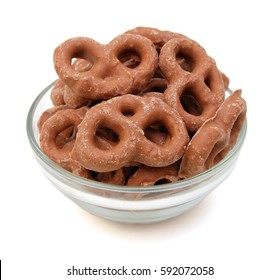 Several Milk Chocolate Covered Pretzels In Glass Bowl On White 