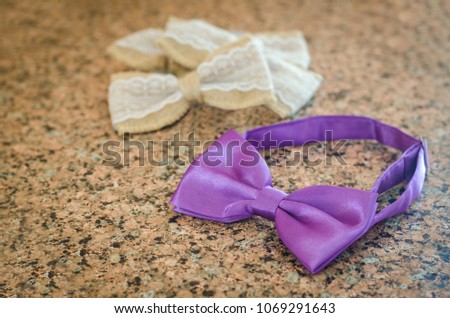 several multi-colored bow tie on the table