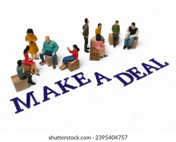 several people sat in groups. around them are the words "make a deal" - Shutterstock ID 2395404757
