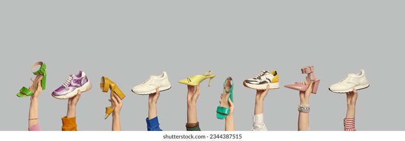 Several people's hands showcasing different colors and styles of summer shoes on isolated light grey background with copy space. Outlet marketing poster. Seasonal footwear promotion - Powered by Shutterstock