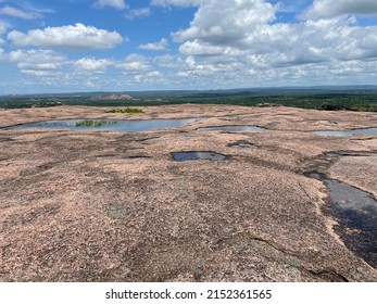 Several Pictures Atop The Pink Granite Peak At Enchanted Rock State Park.