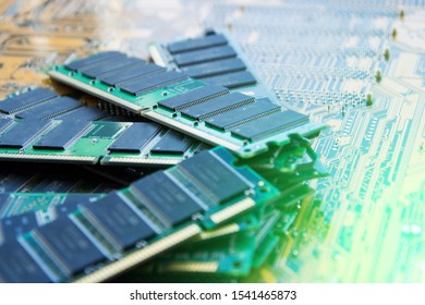 Several Pieces Of Strips Of Memory Modules. Ddr And Sdram Storage. Computer Texture Technology. RAM On The Background Of The Motherboard. Selective Soft Focus.