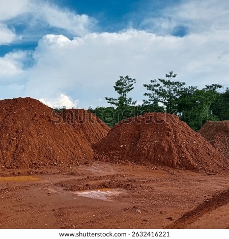 Several piles of soil material containing nickel ore content in the mining area.