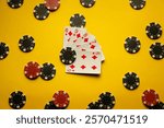 Several playing cards with a straight flush poker combination lie on a yellow table surrounded by chips. The atmosphere is charged with winning excitement and poker strategy.