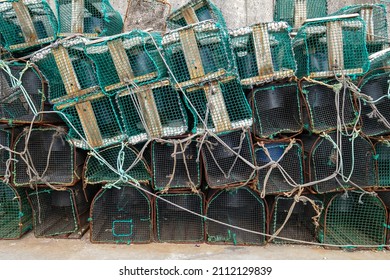several pots for fishing in Asturias Spain stacked in the fishing port, capture of octopus and shellfish