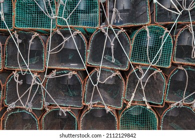 several pots for fishing in Asturias Spain stacked in the fishing port, capture of octopus and shellfish