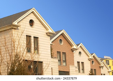 Several side-by-side villas.