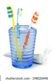 Several toothbrush put in storage and toothpaste