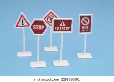 Several warning and prohibition signs on blue background. - Shutterstock ID 2288880601