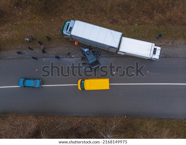 Severe accident.\
Traffic accidents on the road. View from above. The car got into an\
accident. Traffic jam.