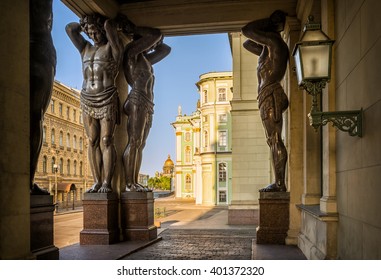 Severe Atlantes Under The Roof Of The Hermitage And St. Isaac's Cathedral