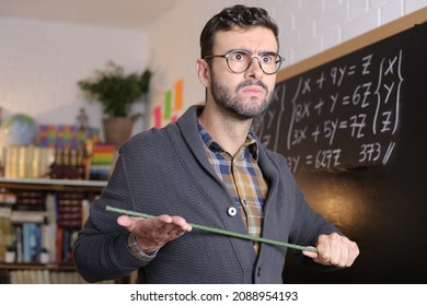 Severe School Teacher Holding Stick